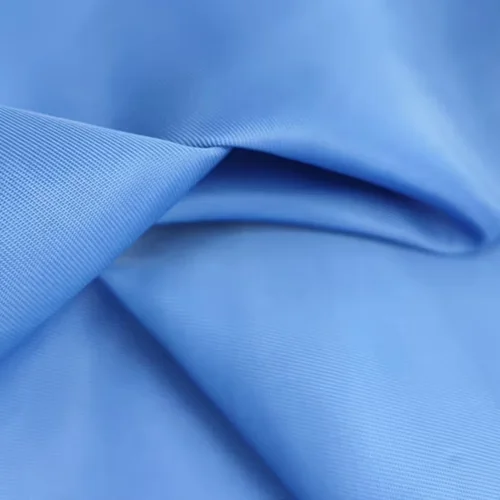 Folded blue fabric with a fine visible weave